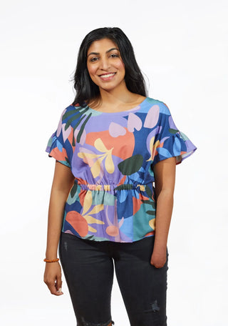 Photo of a woman wearing top made with Cupro