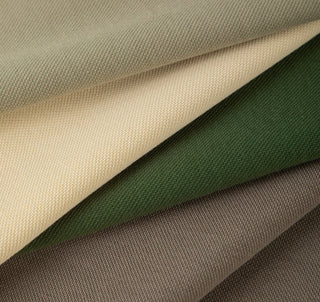 Close up of beige green and brown pique fabric