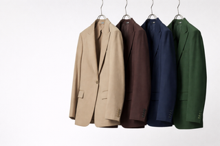 Women wearing a gray suit